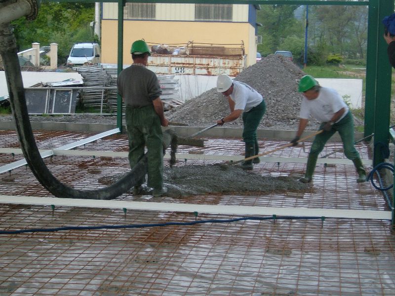Coulage pompe à béton règle Toffolo